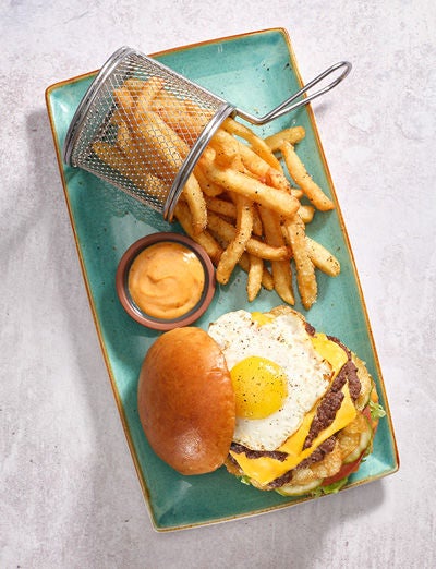 a burger and fries on a plate