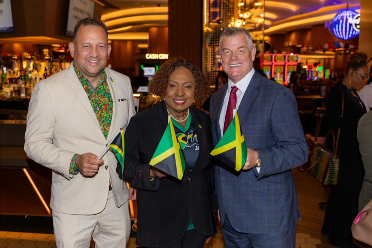Three officials pose at the Stay Strong Jamaica press conference at Seminole Hard Rock Hotel & Casino Hollywood.